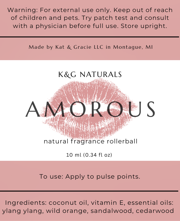K&G Naturals Amorous natural fragrance rollerball label with pink and white design.
