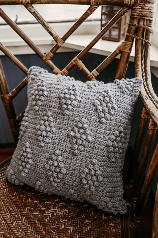 grey-crocheted-farmhouse-pillow