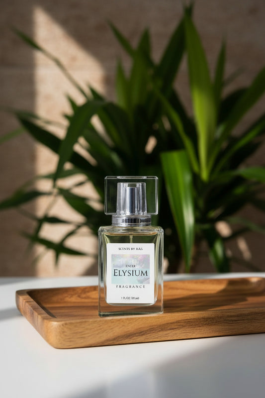 Perfume bottle labeled 'Enter Elysium' on a wood tray in front of a plant